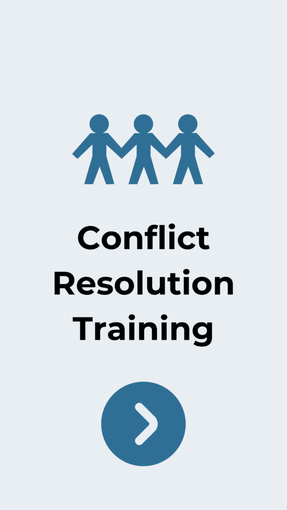 People holding hands in blue, symbolizing teamwork and conflict resolution training.